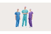Three clinicians wearing BARRIER® Scrub Suit – extra comfort